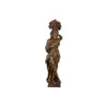 A LARGE 17TH CENTURY FLEMISH OAK CARYATID FIGURE the floorstanding figure carved in the round,