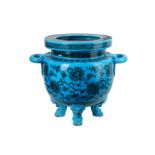 A LARGE LATE 19TH CENTURY MINTONS MAJOLICA TURQUOISE GROUND JARDINIERE IN THE CHINESE TASTE