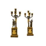 A FINE PAIR OF EARLY 19TH CENTURY FRENCH EMPIRE PERIOD GILT AND PATINATED BRONZE FIGURAL