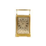 A FINE MID 19TH CENTURY FRENCH GILT BRASS 'ONE PIECE' CARRIAGE CLOCK WITH SUBSIDIARY ALARM AND