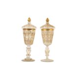 A PAIR OF 19TH CENTURY TURKISH OTTOMAN BEYKOZ GLASS GOBLETS AND COVERS the cut and gilded glass