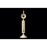 A RARE 19TH CENTURY GERMAN IVORY TABLE BAROMETER / THERMOMETER  the cylindrical shaft surmounted