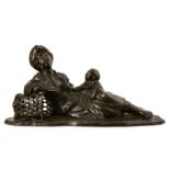 A LARGE LATE 19TH CENTURY JAPANESE MEIJI PERIOD BRONZE FIGURE OF A MOTHER AND CHILD the reclining