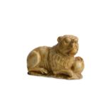 A 15TH CENTURY GOTHIC CARVED ALABASTER MODEL OF A LION possibly English, the reclining beast with