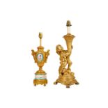 A LOUIS XVI STYLE GILT METAL FIGURAL LAMP BASE TOGETHER WITH ANOTHER  the first depicting a putto