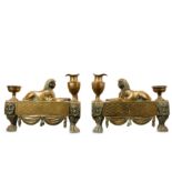 A PAIR OF EARLY 19TH CENTURY REGENCY BRONZE CHENETS CAST WITH SPHINXES, IN THE STYLE OF THOMAS