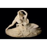 AFTER ANTONIO CANOVA (ITALIAN, 1757-1822): A CARVED ALABASTER FIGURAL GROUP OF CUPID AND PSYCHE