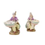 A PAIR OF 19TH CENTURY MEISSEN PORCELAIN OTTOMAN FIGURES SUPPORTING BON BON DISHES MADE FOR THE