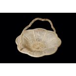 A FINE 19TH CENTURY CHINESE EXPORT CANTON PIERCED IVORY BASKET with scallop edge, the border with