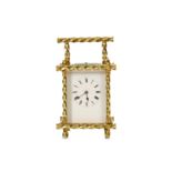 A LATE 19TH / EARLY 20TH CENTURY FRENCH LACQUERED BRASS CARRIAGE CLOCK WITH BAMBOO STYLE CASE the