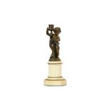 A LATE 19TH CENTURY FRENCH BRONZE AND WHITE MARBLE FIGURAL CANDLESTICK the standing figure of