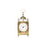 AN EARLY 19TH CENTURY FRENCH BRASS STRIKING TRAVELLING OR CAPUCINE CLOCK WITH ALARM SIGNED 'LEROY