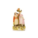 A 19TH CENTURY ENGLISH STAFFORDSHIRE POTTERY FIGURE OF REBECCA AND ELIEZER AT THE WELL, MADE FOR THE