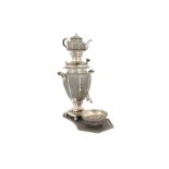 A MINIATURE IRANIAN SILVER SAMOVAR