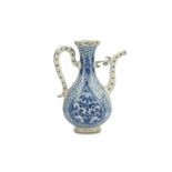*A SMALL BLUE AND WHITE POTTERY EWER