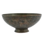 AN ENGRAVED TINNED COPPER BOWL