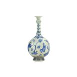 *A CHINESE-STYLE BLUE AND WHITE POTTERY VASE