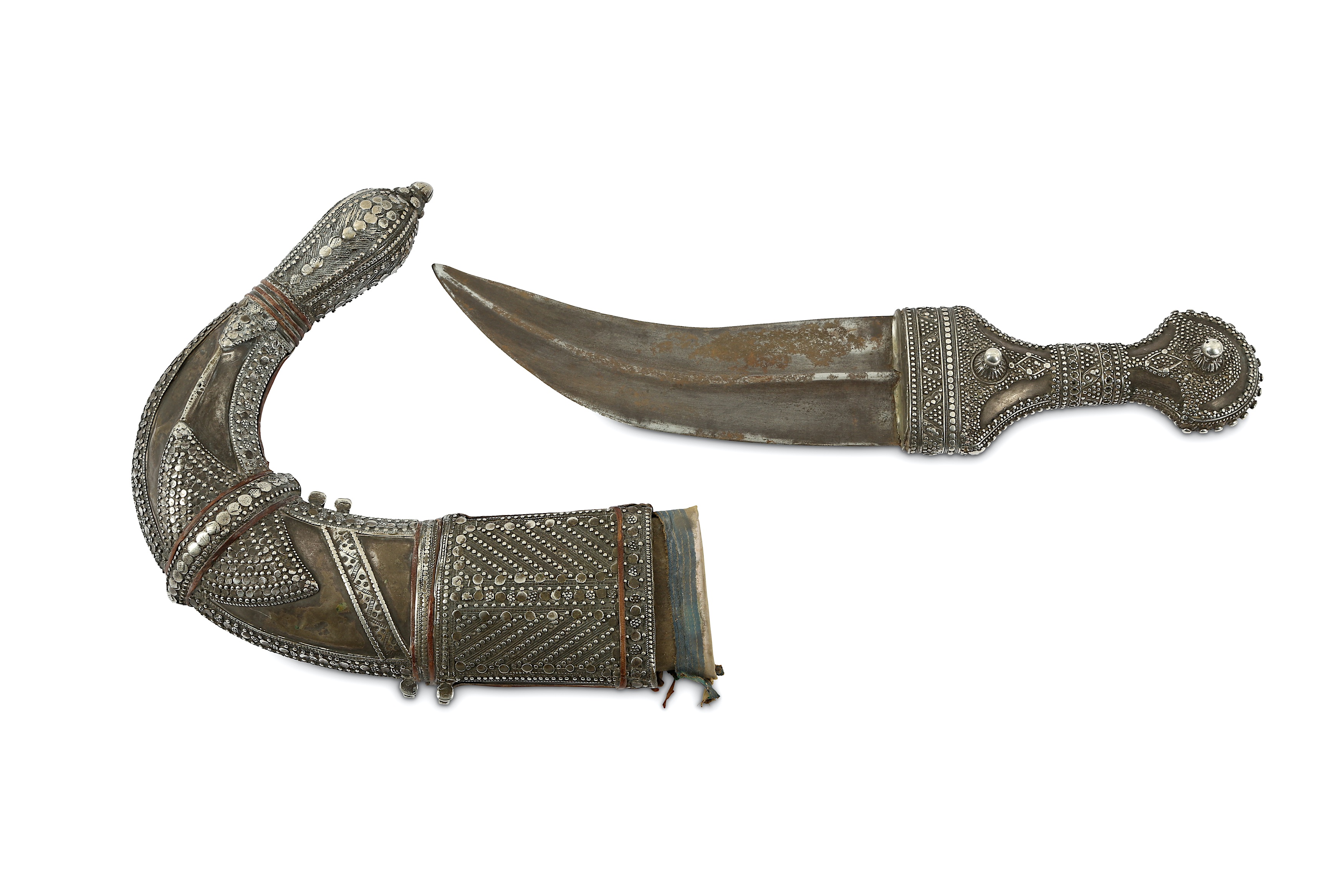 AN OMANI SILVER-MOUNTED JAMBIYA DAGGER