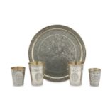 A SILVER CIRCULAR TRAY AND FOUR BEAKERS
