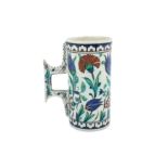 A LARGE IZNIK-STYLE CANTAGALLI POTTERY TANKARD