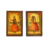 *A MATCHING PAIR OF QAJAR LACQUERED PAPIER-MÂCHÉ FIGURAL BOOKCOVERS