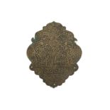 A DECORATIVE BRASS DOOR PLAQUE