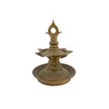 AN INDIAN BRASS HANGING OIL LAMP