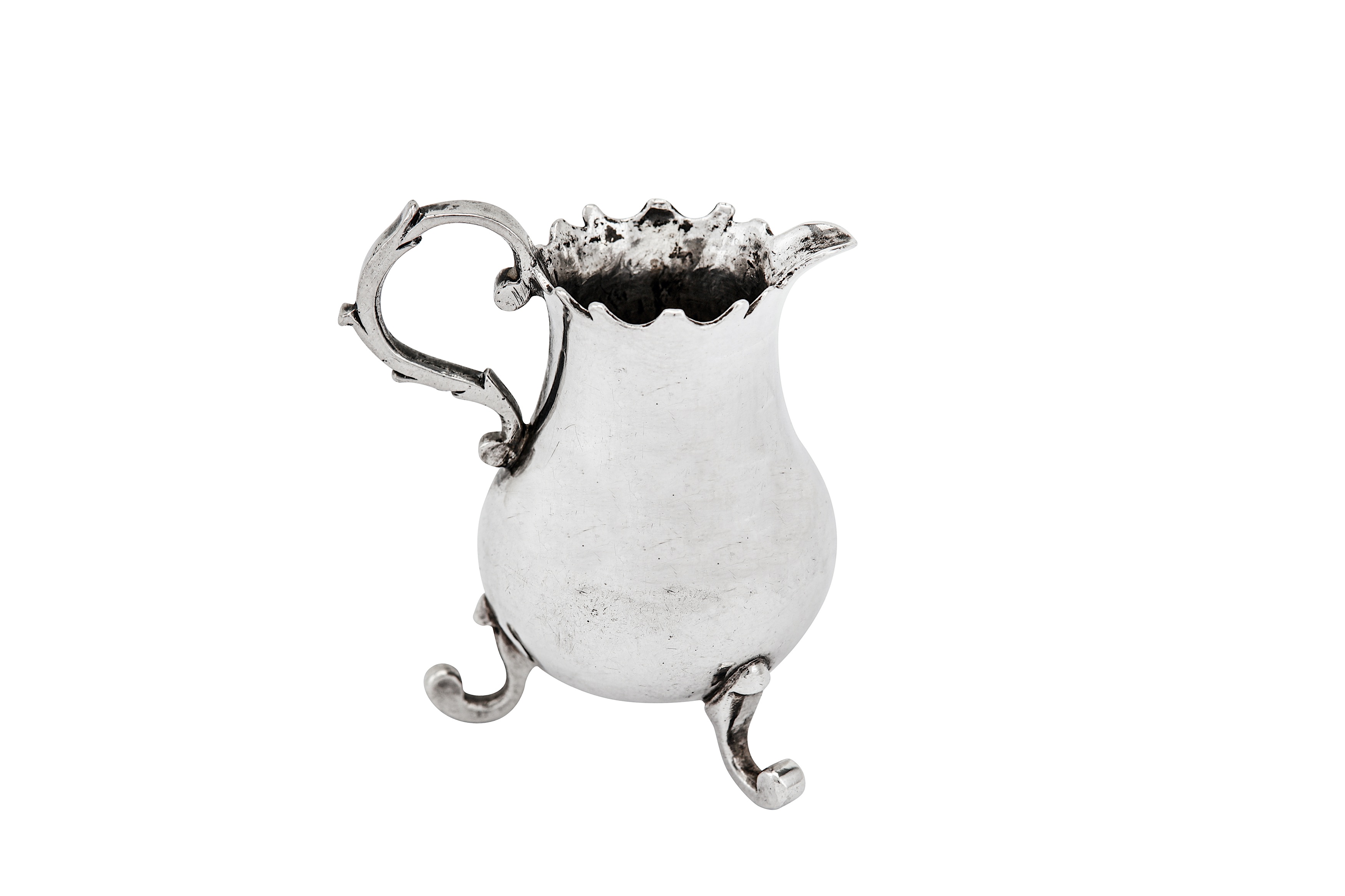 A mid-18th century Dutch 'toy' miniature silver cream jug, Amsterdam 1768 by Arnoldus Van Geffen