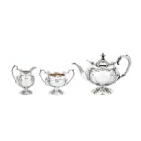 An Edwardian sterling silver three-piece bachelor tea set, Sheffield 1903 by Fenton, Russell & Co