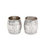 A pair of Edwardian sterling silver novelty whiskey cups or drams, Birmingham 1902 by Thomas Hayes