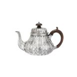 A Victorian sterling silver abercorn pattern bachelor teapot, London 1849 by Robert Garrard II (reg.