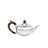 A very small George V sterling silver bachelor teapot, London 1921 by Charles and Richard Comyns