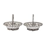 A pair of George V sterling silver sweetmeat baskets, London 1916 by Lionel Alfred Crichton