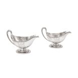 A pair of George III sterling silver sauceboat, London 1784 by Edward Wakelin and William Taylor