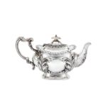 An Edwardian sterling silver bachelor teapot, Birmingham 1902, makers mark obscured ?S