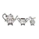 A matched Victorian sterling silver three-piece tea service, the teapot and sugar bowl, Sheffield