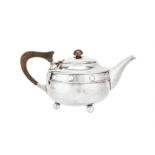 A George V sterling silver ‘arts and crafts’ teapot, Birmingham 1923 by A. E. Jones