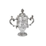 A fine early George III sterling silver twin handled cup and cover, London 1760 by Charles Wright