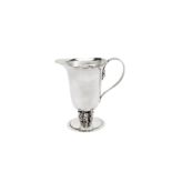 A George V sterling silver cream or milk jug, London 1930 by Charles Boyton