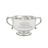 A George V sterling silver presentation twin handled trophy bowl, Birmingham 1921 by William Hutton