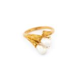 A cultured pearl and diamond ring, by Mikimoto