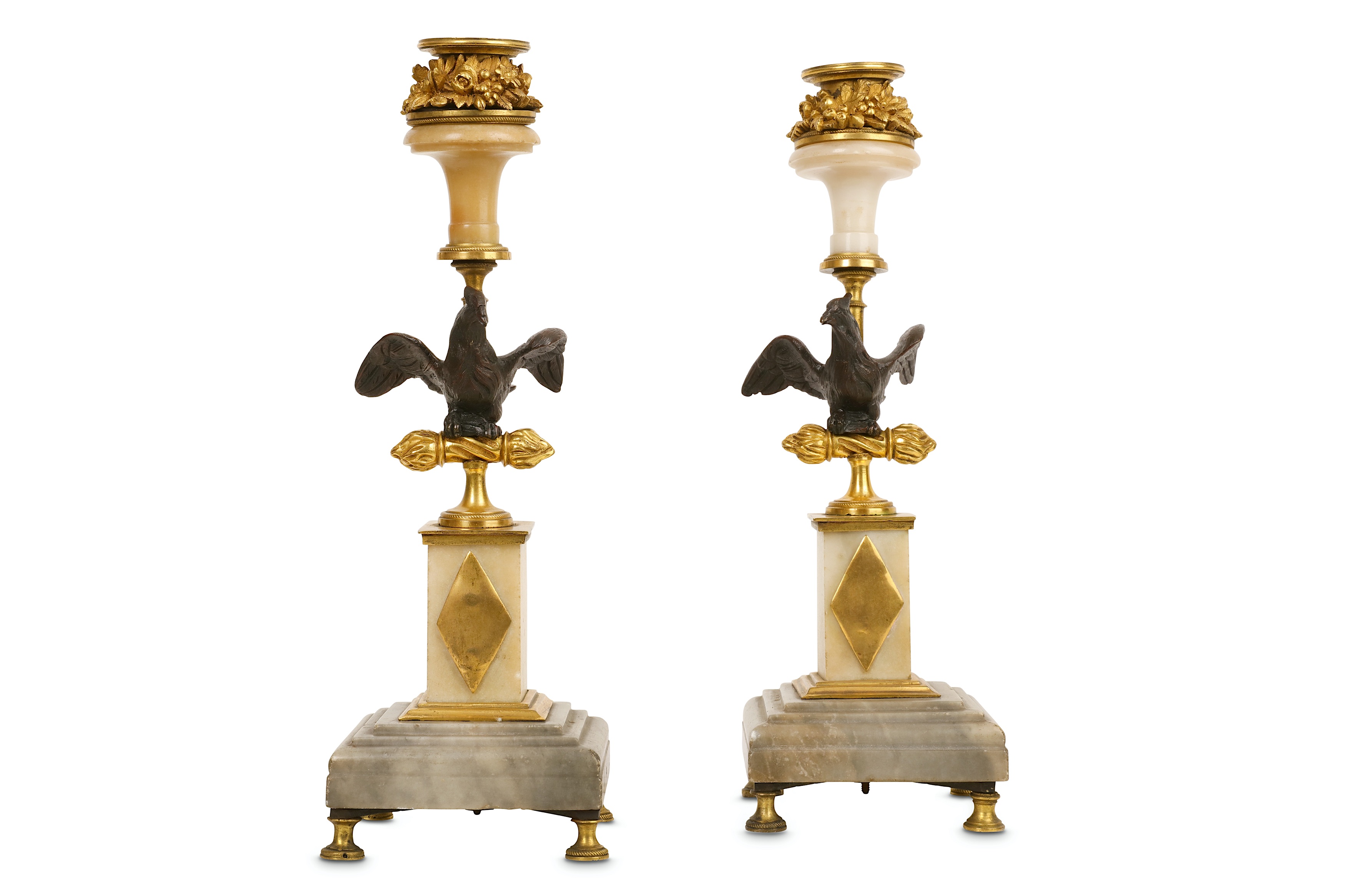 A pair of 19th century gilt and patinated bronze and marblecandlesticks