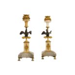 A pair of 19th century gilt and patinated bronze and marblecandlesticks