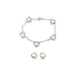 A heart bracelet and earrings, by Elsa Peretti for Tiffany & Co.
