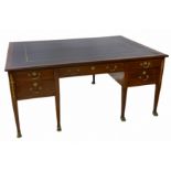 A French Empire style mahogany kneehole partners desk