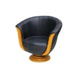 A late 20th Century Art Deco style shell back tub chair