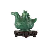 A Chinese green hardstone 'duck' archaistic vessel and cover, zun.
