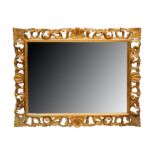 A late 20th Century Florentine style rectangular giltwood framed wall mirror