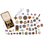 A mixed lot of miniature medals, coins and sewing sets