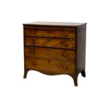 † A George III mahogany bachelors chest